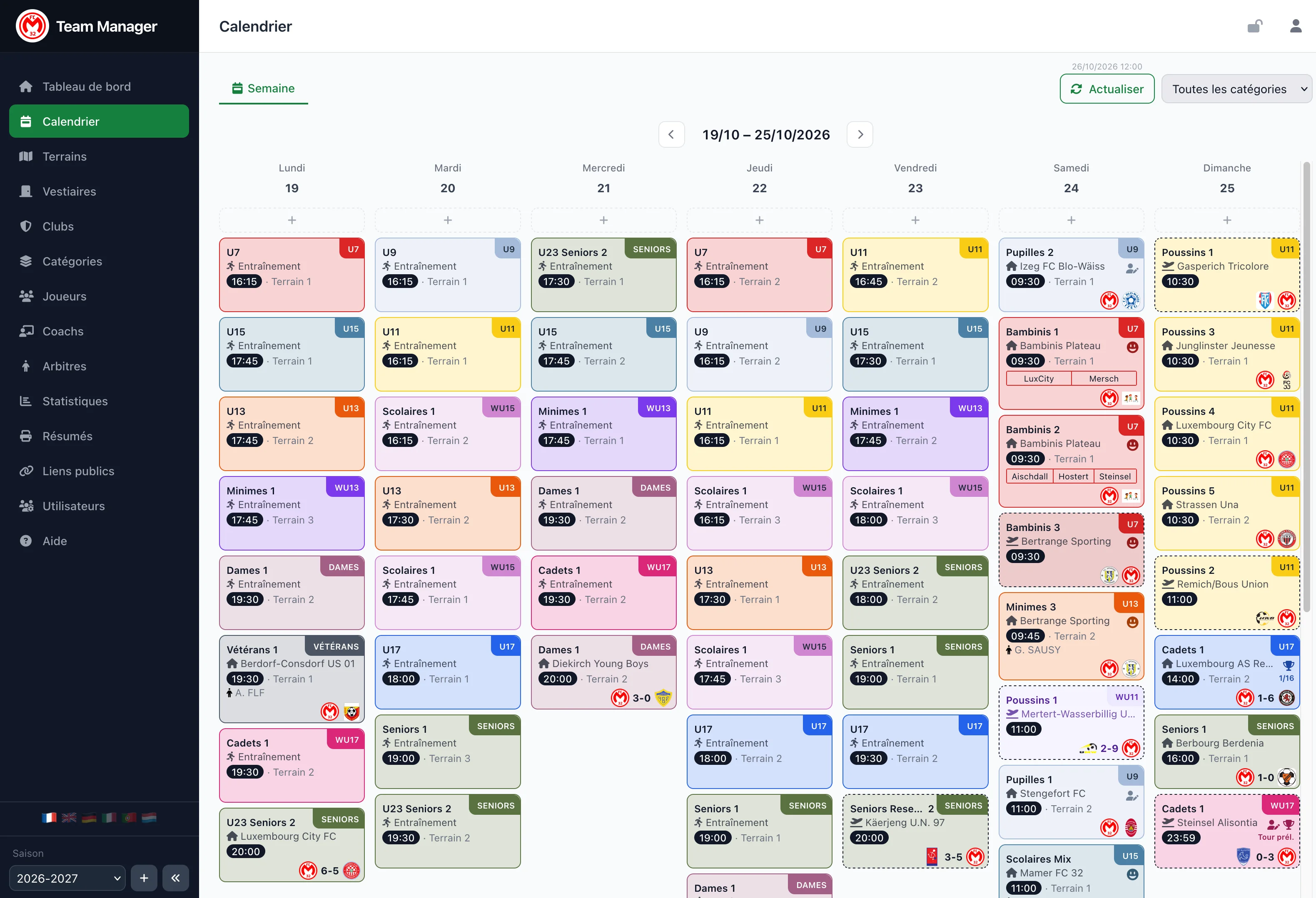 Le calendrier de Team Manager : la semaine du 12 au 18 octobre 2026, un jour par colonne, chaque match et entraînement avec son heure, son terrain, son adversaire et le nombre de présents.